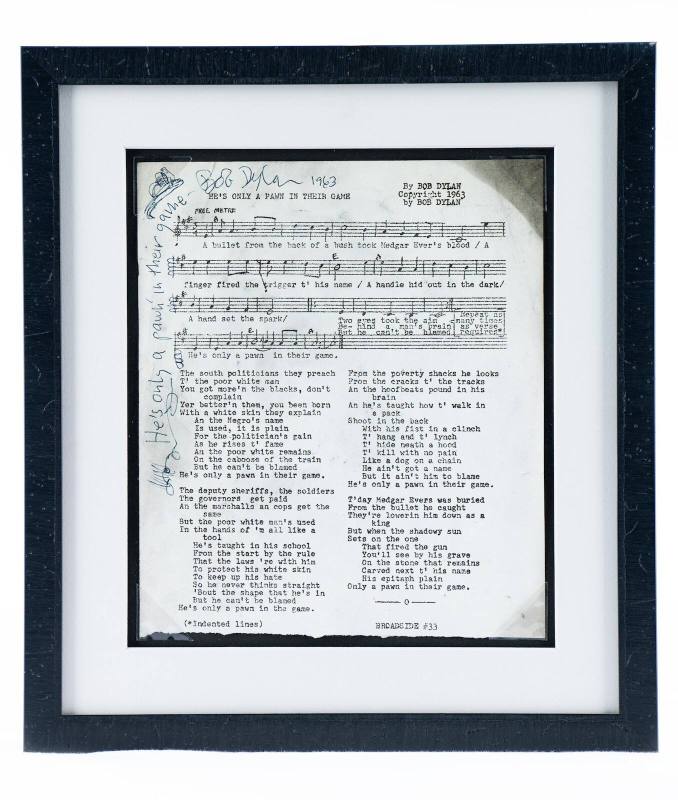 Bob Dylan signed and inscribed lyrics for "He's Only A Pawn In Their Game"