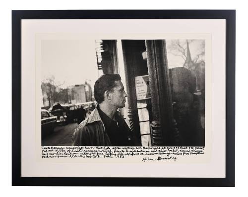 Framed black and white photograph of Jack Kerouac with inscription by Allen Ginsberg